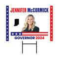 a political sign with a picture of a woman