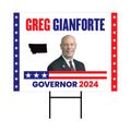 a political sign with a picture of a man in a suit