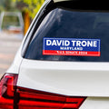 a bumper sticker on the back of a car