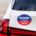 a sticker on the back of a white car