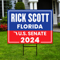 a real estate for sale sign in front of a house