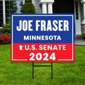 a real estate for sale sign in front of a house