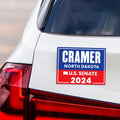 a bumper sticker on the back of a car