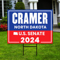 a real estate for sale sign in front of a house