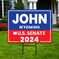 a political yard sign in front of a house