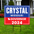 a real estate for sale sign in front of a house
