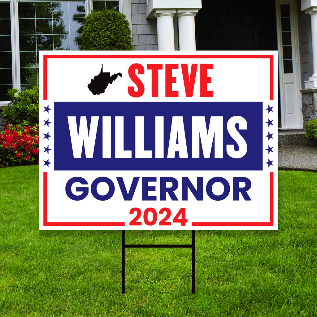 a political yard sign in front of a house