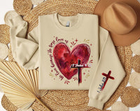 Heart Cross Valentine Jesus Sweatshirt, We Love Because He First Loved Us Tee, Valentine Bible Verse Sweatshirt, Front Sleeve