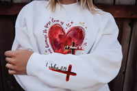 Heart Cross Valentine Jesus Sweatshirt, We Love Because He First Loved Us Tee, Valentine Bible Verse Sweatshirt, Front Sleeve
