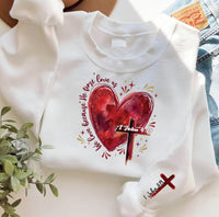 Heart Cross Valentine Jesus Sweatshirt, We Love Because He First Loved Us Tee, Valentine Bible Verse Sweatshirt, Front Sleeve