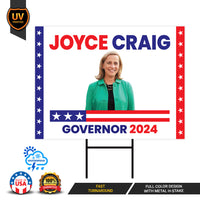a political sign with a woman standing in front of it