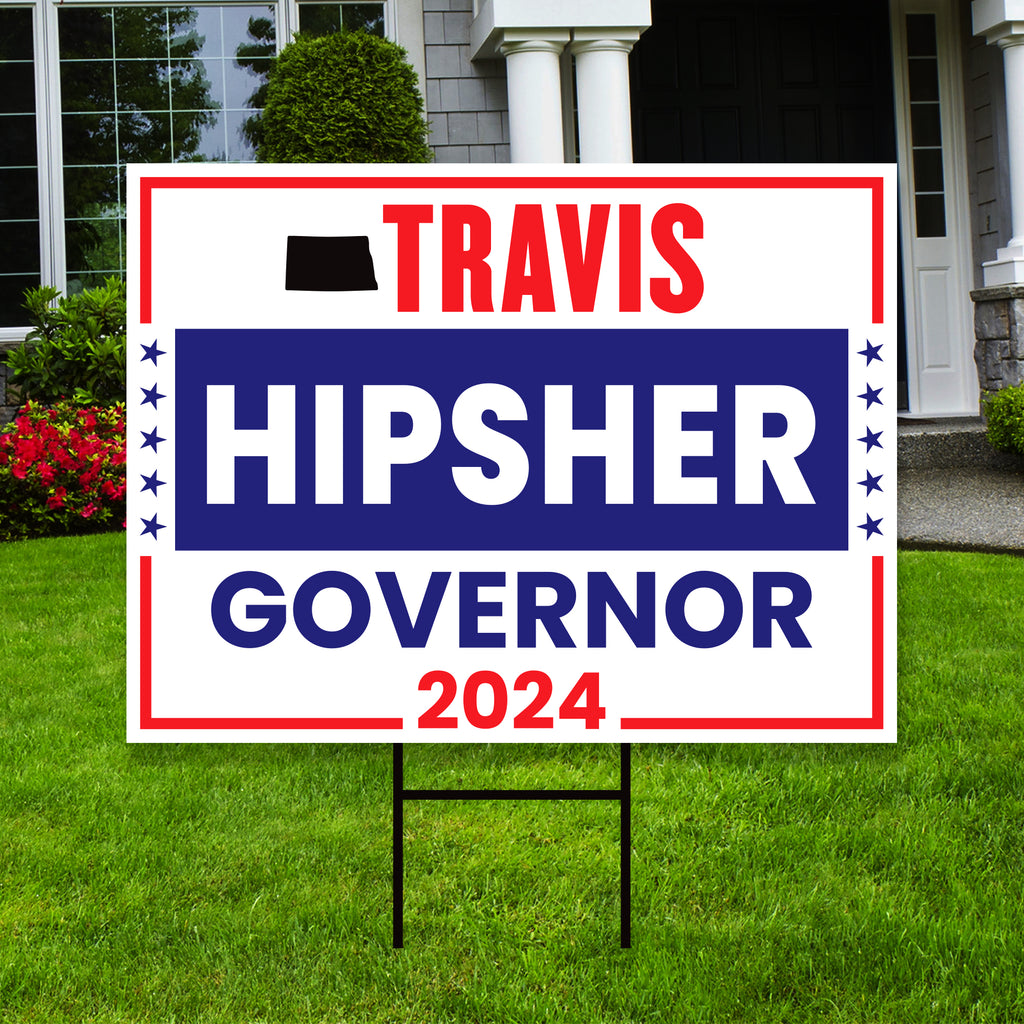 a political yard sign in front of a house