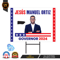a political sign with a man standing in front of it