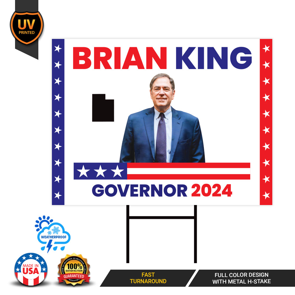 a political billboard with a picture of a man in a suit