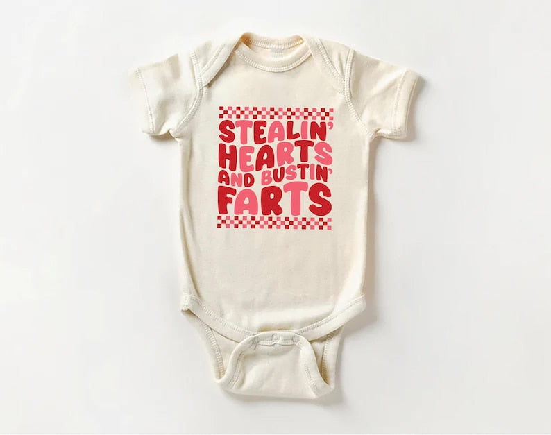 Stealin’ Hearts and Bustin’ Farts Baby Bodysuit