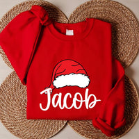 Personalized Family Christmas Shirt, Custom Santa Hat Name Sweatshirt, Matching Holiday Crew Tee, Xmas Pajama Top, Gift for Loved Ones