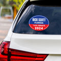 a sticker on the back of a car that says rick scott florida