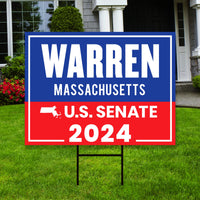 a political yard sign in front of a house