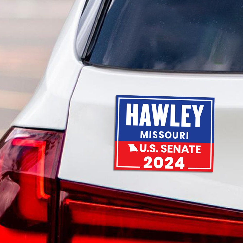 a sticker on the back of a white car
