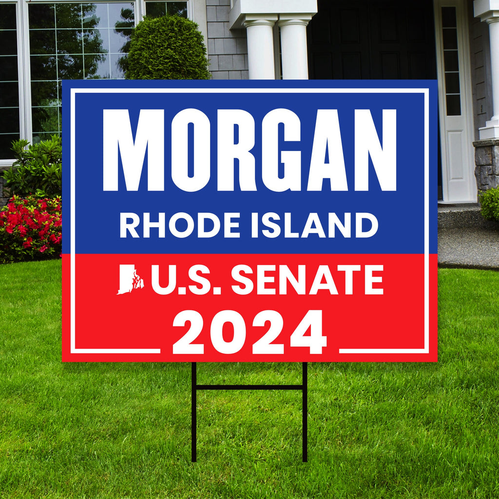 a political yard sign in front of a house