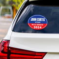 a car with a political sticker on it