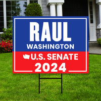 a real estate for sale sign in front of a house