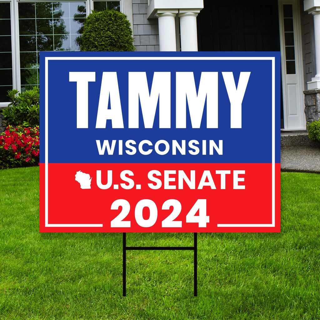 a political yard sign in front of a house