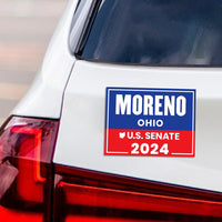 a white car with a red and blue license plate