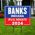 a real estate for sale sign in front of a house