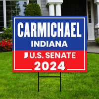 a political yard sign in front of a house