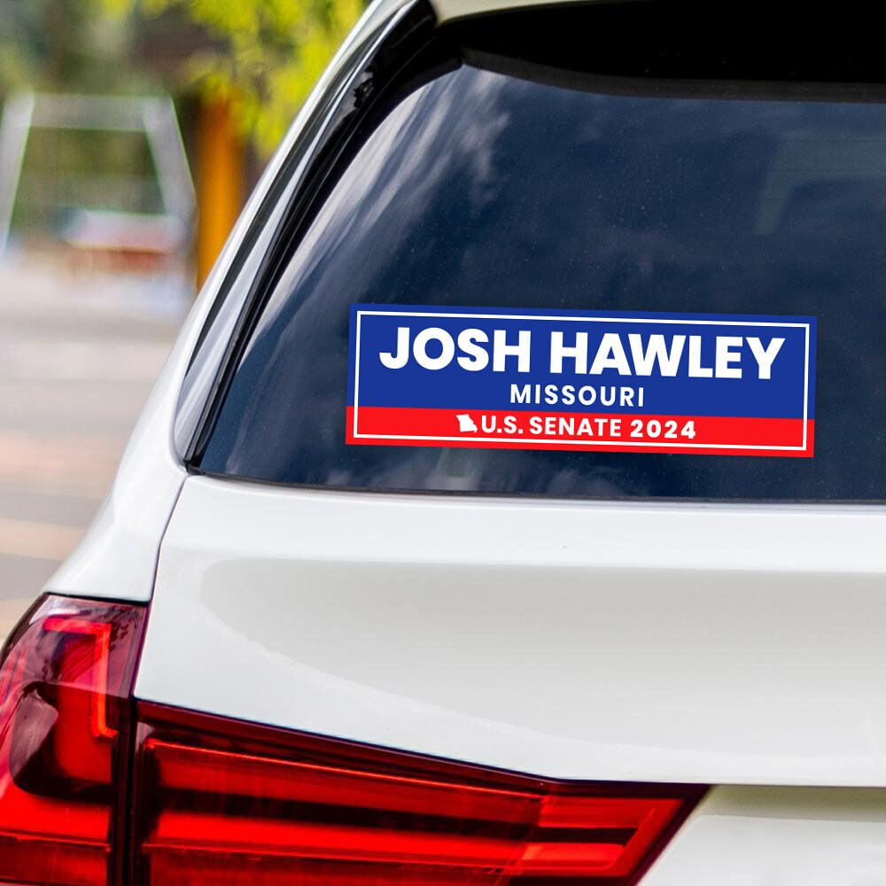 a sticker on the back of a white car