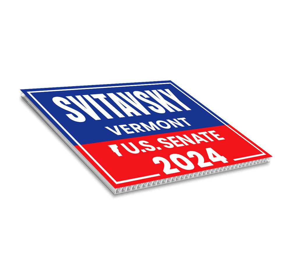 a red, white and blue sticker on a white background