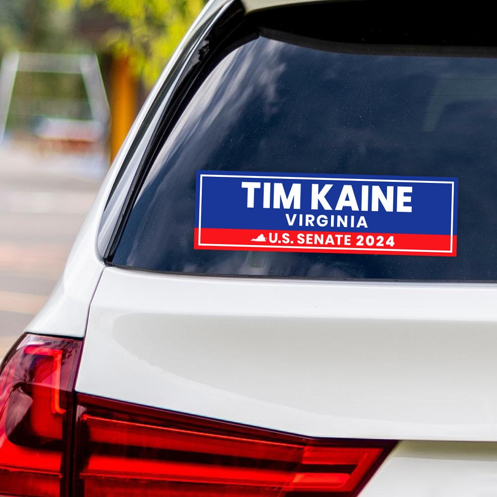 a bumper sticker on the back of a white car