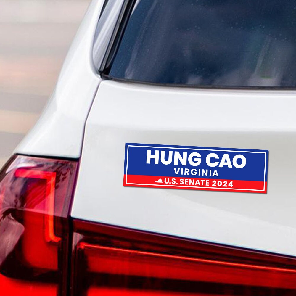 a sticker on the back of a white car