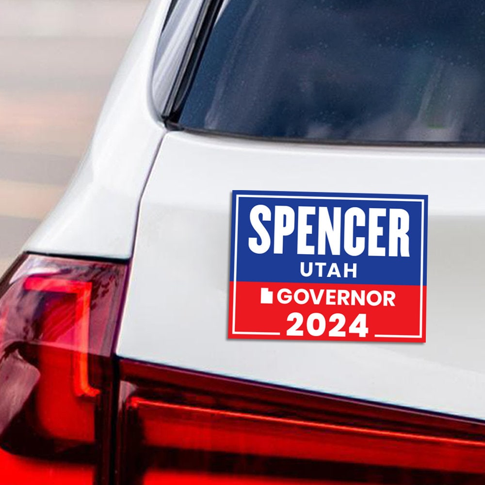 a bumper sticker on the back of a car