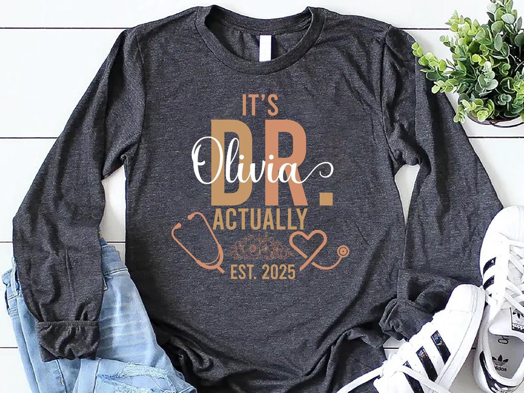 It’s Dr. Actually Long Sleeve Shirt