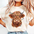 Highland Cow Christmas Shirt, Cow with Christmas Lights Shirt, Holiday Western Farm Tee